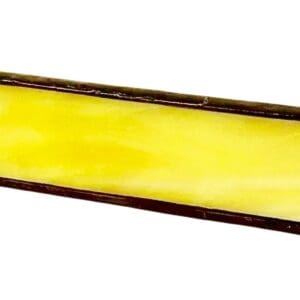 A yellow glass strip with brown trim.