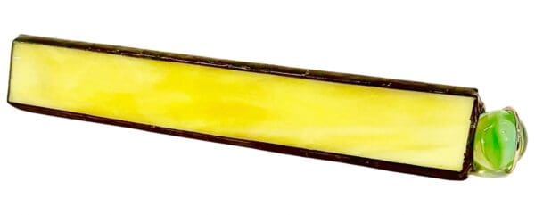 A yellow glass strip with brown trim.