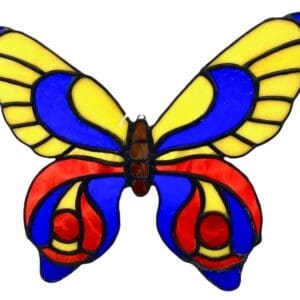 A stained glass butterfly with blue, yellow and red wings.